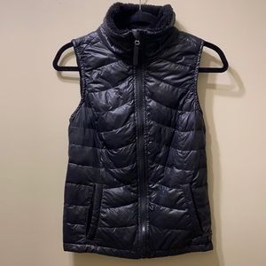 Calvin Klein puffer vest with sweater back and fleece collar. Wms. Small, black